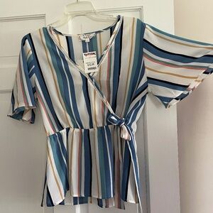 **NEW WITH TAGS** Women’s peplum blouse